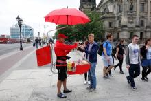 Sampling one of Germany’s hundreds of varieties of sausage from a street vendor is a classic German experience.